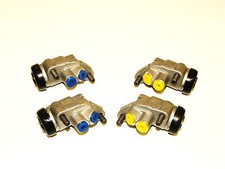 AUSTIN A40 DEVON & SOMERSET 1950 - 1956  A SET OF FOUR FRONT WHEEL CYLINDERS