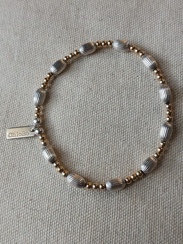 Chlobo silver and yellow gold - and,