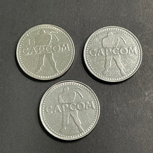 Capcom arcade token coin - x,