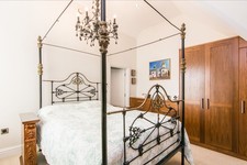 ANTIQUE VICTORIAN FOUR POSTER BED