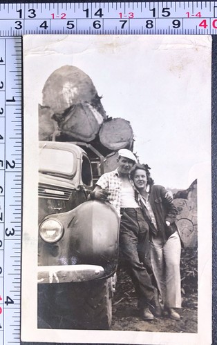 Man woman logging truck - logging, trees
