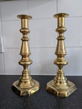 A Pair Of Brass Candlesticks