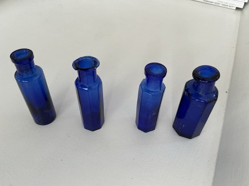 Blue poison bottles - poison,