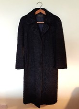 Black Astrakhan woman's long