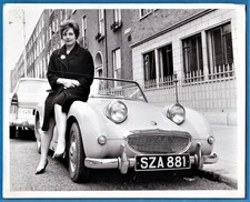 large vintage photo girl on Austin Healey Sprite Frogeye car auto UK ca 1960