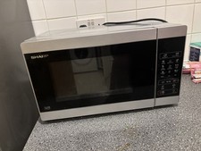 Sharp YC-MG02U-S 20L 800W Microwave w Grill, Silver FOR PARTS ONLY doesn’t work