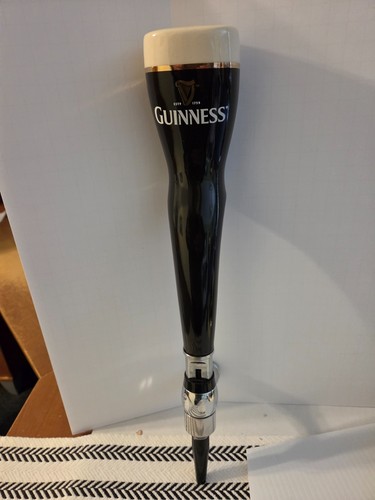 Guinness beer tap handle with - tap,