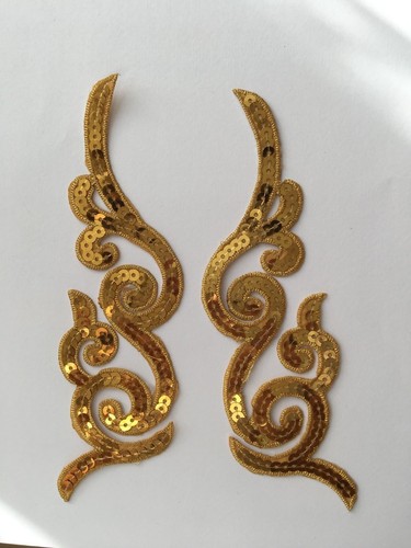 Pair sequined applique - of,