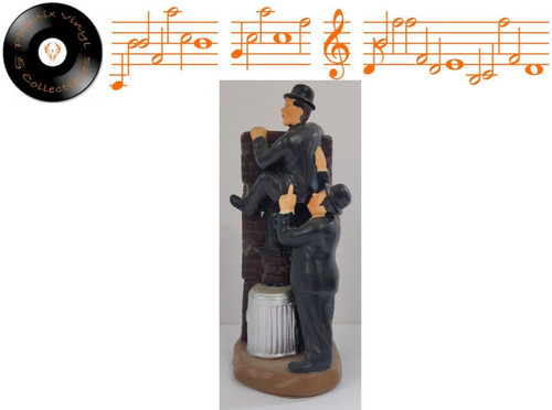 Laurel hardy climbing over - laurel,
