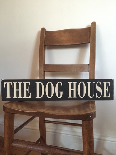 The dog house sign wooden - the,