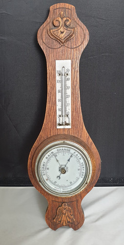 Carved oak aneroid - carved, banjo