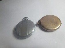 2 vintage  pocket  watches  1 buren grand prix  1 grosvenor