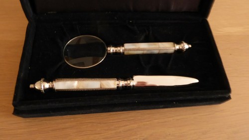 Glass magnifer and letter - magnifer,