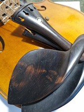 Violin chin rest, pegs, button