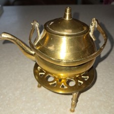 Vintage brass trivet and kettle with handle