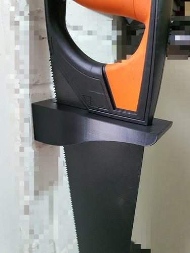 Hand saw wall - van, holder.
