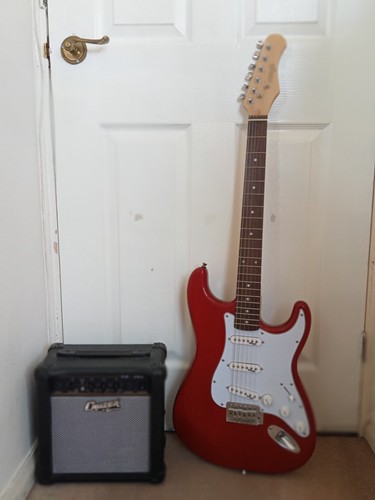 Stagg red electric guitar with