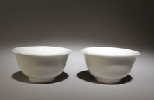 A Pair of White Glazed Cups