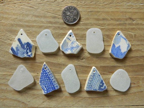 Drilled sea pottery - 10, and
