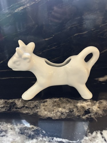 White porcelain cow milk - white,