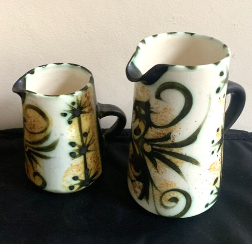 Pair newlyn milk jugs - newlyn,
