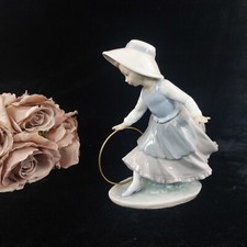 NAO Spain Acceptable  Girl Figurine with Hoop Glazed Porcelain  Worn Base A-16M