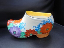 A Clarice Cliff Sabot / Clog in GAY DAY pattern.