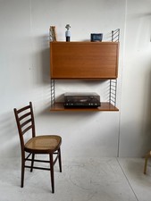 Mid century Striing wall hanging vinyl cabinet and shelving for a record player