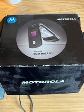 Motorola RAZR V3 with charger and accessories
