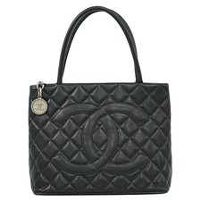 CHANEL CC Medallion Leather