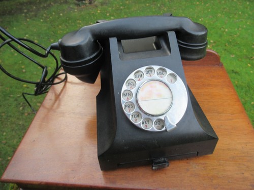 Black bakelite rotary dial - black,