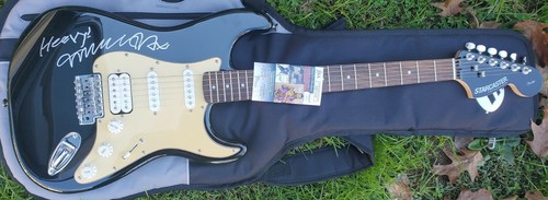 Autographed fender michael - fender,