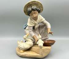 Nao by Lladro Girl Feeding