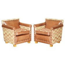 PAIR OF ANDREW MARTIN MARLBOROUGH BROWN LEATHER REVERSIBLE KILIM ARMCHAIRS