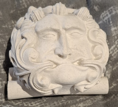 Green man stone - carving, garden