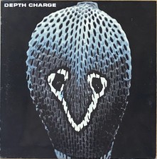 Depth Charge – Legend Of The Golden Snake/Sex Sluts & Heaven 10” Vinyl VERY GOOD