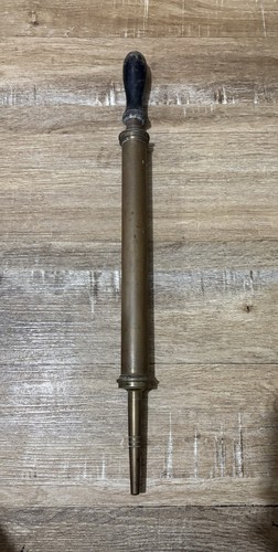 Antique brass pump syringe - or,