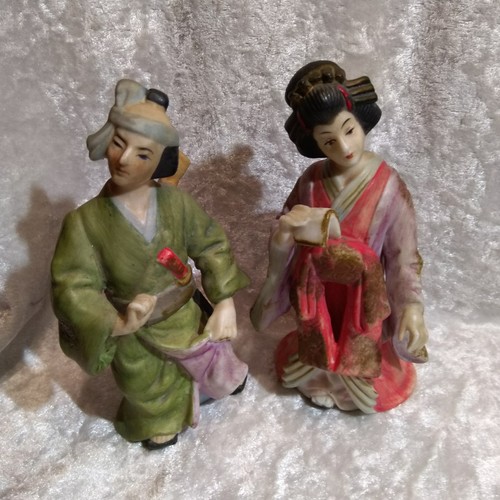Pair oriental figurines - pair,