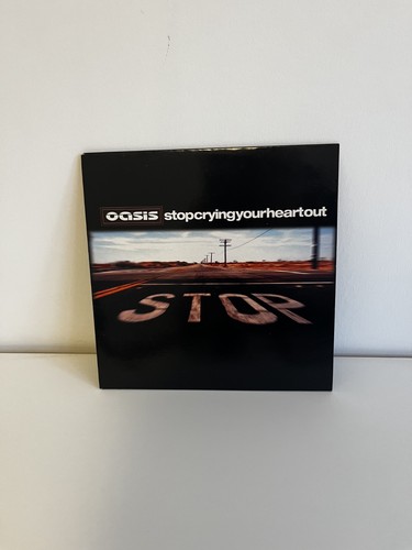 Oasis stop crying your heart - stop,