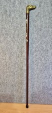 Wooden walking stick with a