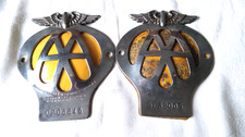 TWO VINTAGE AA CAR BADGES