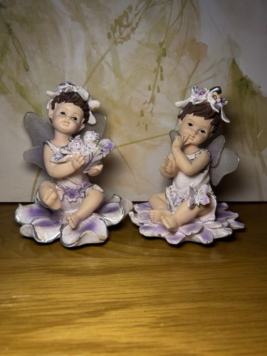 Vintage baby fairy figurines