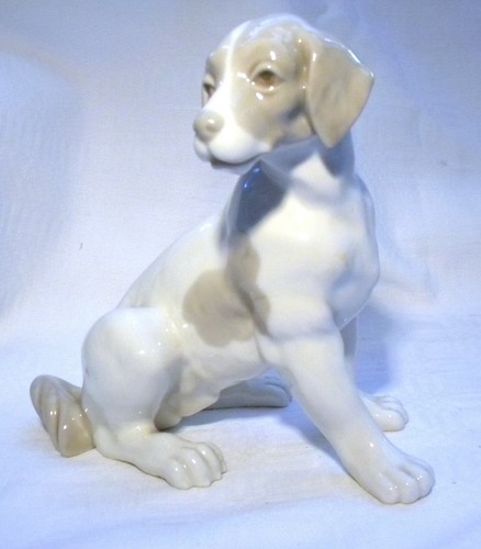 Nao lladro sitting - ,