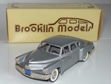 (S) BROOKLIN MODELS TUCKER
