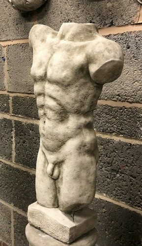 Male and female torso statue - and,