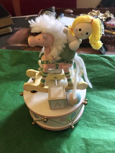 Wooden musical little - girl, on