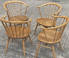 FINE RETRO ERCOL COWHORN