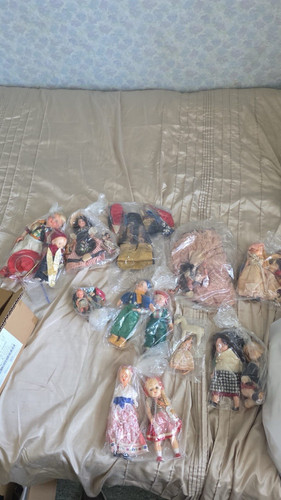 Various vintage dolls and