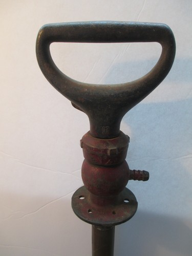 Antique hand fluid pump cast - hand,