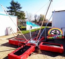 NEW FOR 2024 OUR DELUXE FULLY GALVANIZED 4 BED TRAILER MOUNTED BUNGEE TRAMPOLINE